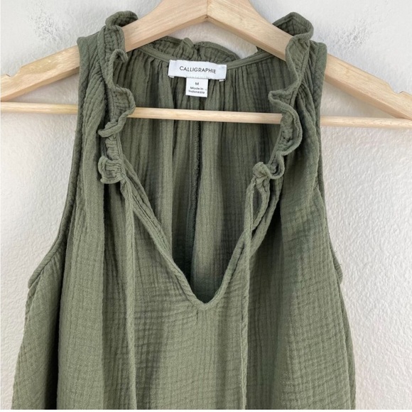 Calligraphie Women Medium
Green Seashell Tie Swing Tank Top
Sleeveless Shirt - Picture 3 of 9